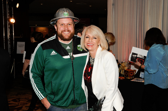 Tracy Curtis, Regional VP for Wells Fargo and one of the 2015 Purse-o-nalities, poses with Timber Joey