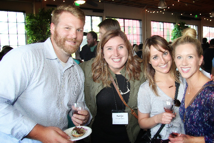 Katelyn Callaghan-Manning (center), a Corks + Forks committee member, and friends enjoying the evening’s selection of regional wines and cuisine from Portland-area restaurants.