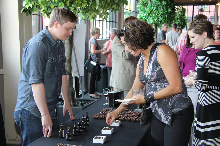 Pitch Dark Chocolates samples its artisan chocolate and Cacao Bitters at the June 11 event in northwest Portland.