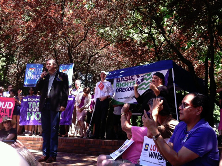 Senator Jeff Merkley and Senator Ron Wyden address supporters at the rally