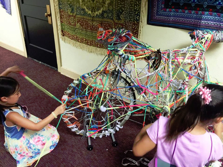 What is Yarn Bombing? Call it what you will: yarn storming, guerrilla knitting, kniffiti. It’s street art made with knitted or crocheted yarn or fiber. Look for the bicycle set up at Lakewood in the special exhibit, "On the Fringe - Today's Twist on Fiber Art," for the kid in all of us. Then let your muse be your guide as you add your personal touch and favorite colors to the bicycle. Fun for the whole family. You can participate in this interactive art experience at this year's Festival at Lakewood Center for the Arts through June 28.