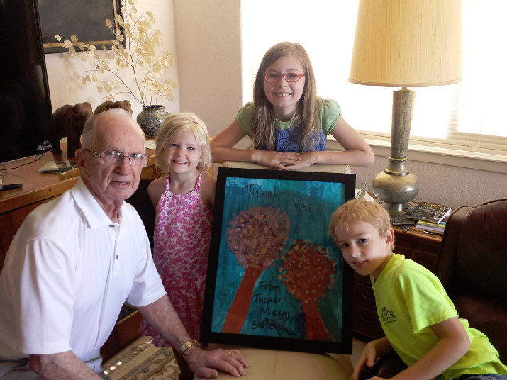 Rebecca Archer's Uncle Charlie receives some very special artwork from the kids at Tucker-Maxon for being an auction sponsor! Thanks to Frances and Charles Emerick for supporting our students!