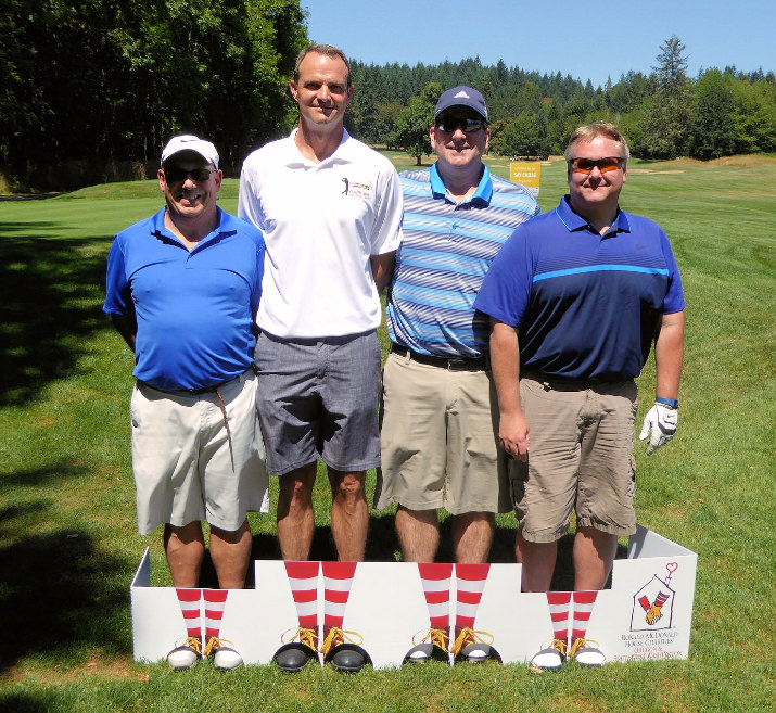 David Payne (far right) is joined by his team representing The Standard, this year's presenting sponsor. David, a long time supporter of RMHC, is a board member and also served as the chair on this year's RMHC Golf Classic committee. 