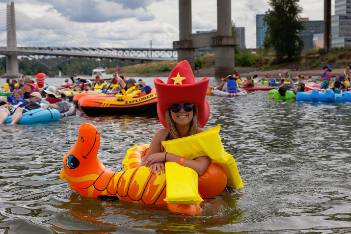 It's a competition to come up with the most colorful floats and hats to boot! 