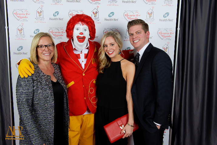 RMHC Board Member Mona Westhaver (left) is joined by Ronald McDonald and Sarah & Carter Beyl