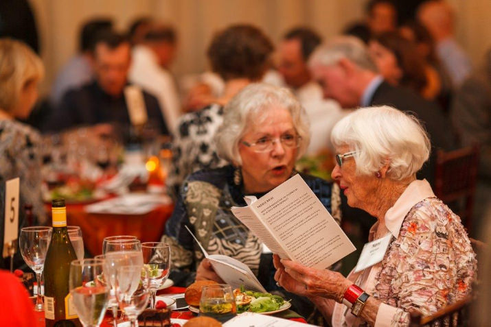 Nani Warren & Penny Guest look over auction items. 