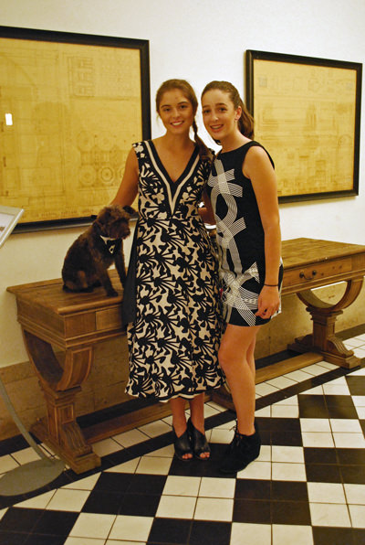 Models Genevieve Klein and Nicole Gooding pose with Freddie Klein