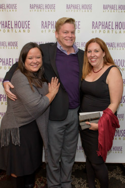 Lisa Watson (left) and Shannan Troyer (right) of Cupcake Jones pose with Andrew Tweedie of Wells Fargo Bank (middle). 