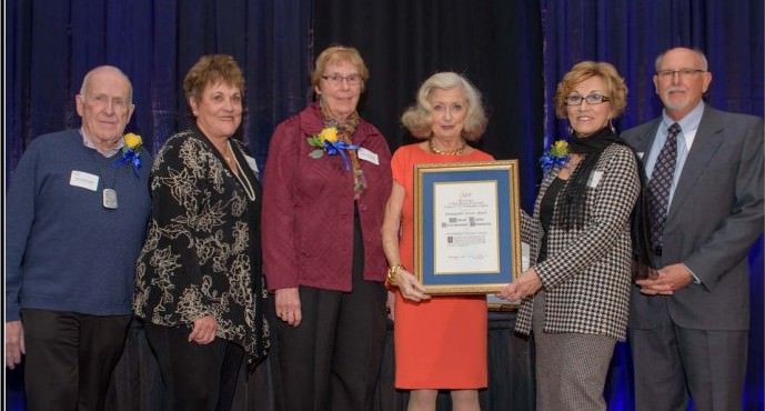 Outstanding Volunteer Group Award to Medical Teams International Volunteers represented by (l to r): Dr. Dale Canfield, Dr. Mary Burry, Helen Unfred, MC Gwyneth Gamble Booth, Presenter and MTI Board Member Pat Reser, and volunteer Dr. Tom Hoggard