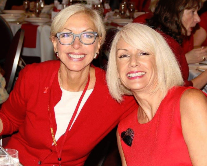  First Lady of Portland, Nancy Hales and Go Red For Women Chairwoman, Tracy Curtis, Executive Vice President, Oregon Region President, Wells Fargo, show off their red at the Luncheon. 