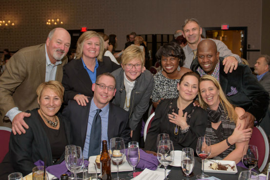 Staff from Bronze Sponsors Nike/Jordan gather for a photo in the beautiful Nines Hotel ballroom.