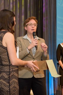 House Speaker Tina Kotek calls out the evening’s Golden Ticket Raffle winner, who took home the live auction package of their choice.