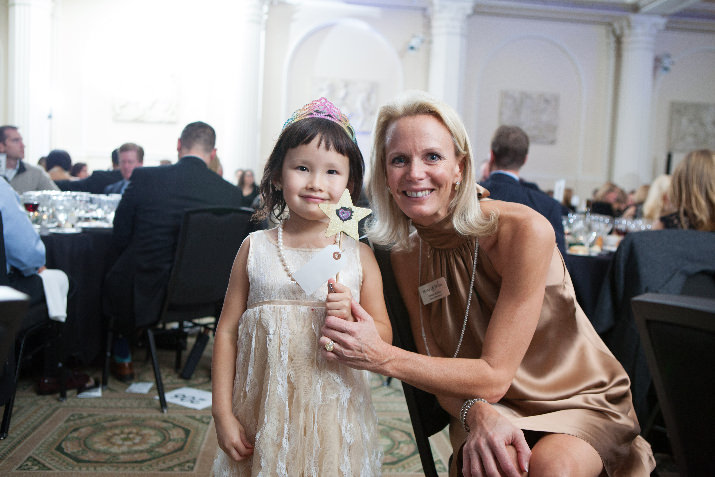 5-year-old wish child Lexi with Make-A-Wish Oregon Board Member Erika Miller. Lexi designed and painted special wish wands for guests to bid on at the VIP Fundraising Dinner.