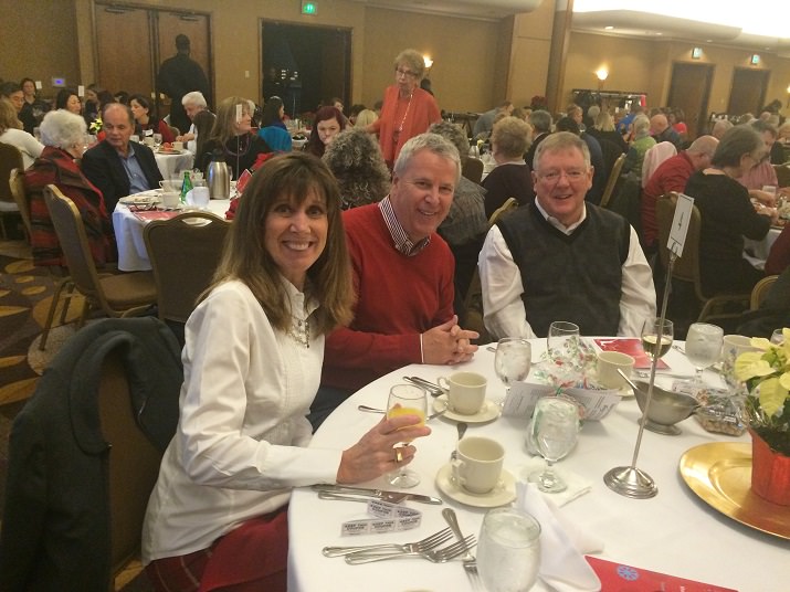 Colleen Wall, Frank Wall and Jim Moss enjoy each other's company while waiting for lunch to be served.