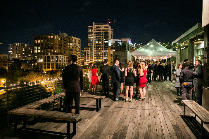 Guests enjoy the beautiful cityscape from atop the Portland EcoTrust building.
