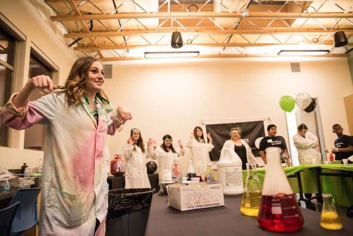 The center also has places for kids to learn and Marie Marshall was lending a hand in the science lab.