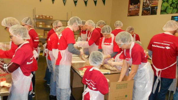Bank of America and other community volunteers help Oregon Food Bank pack more than 100,000 pounds of food for the Martin Luther King Jr. day of service.