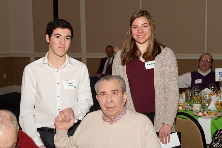 David Menashe (left) and Sydney Kobak (right) are congratulated by Harry Glickman (center) after they have been awarded the Harry Glickman Scholar Athlete Award given annually to a Jewish male and female high school student who exemplify excellence on the field, in the classroom and in the community.