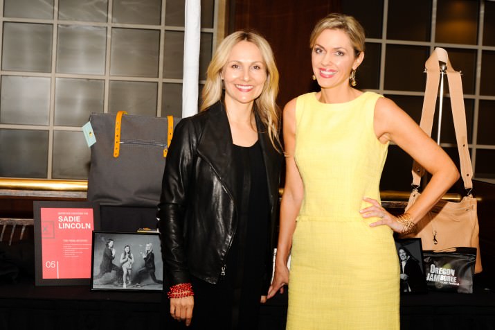 2016 Purse-o-nalities, barre3's Sadie Lincoln and KOIN 6 News' Jenny Hansson, pose in front of their one-of-a-kind design purses.