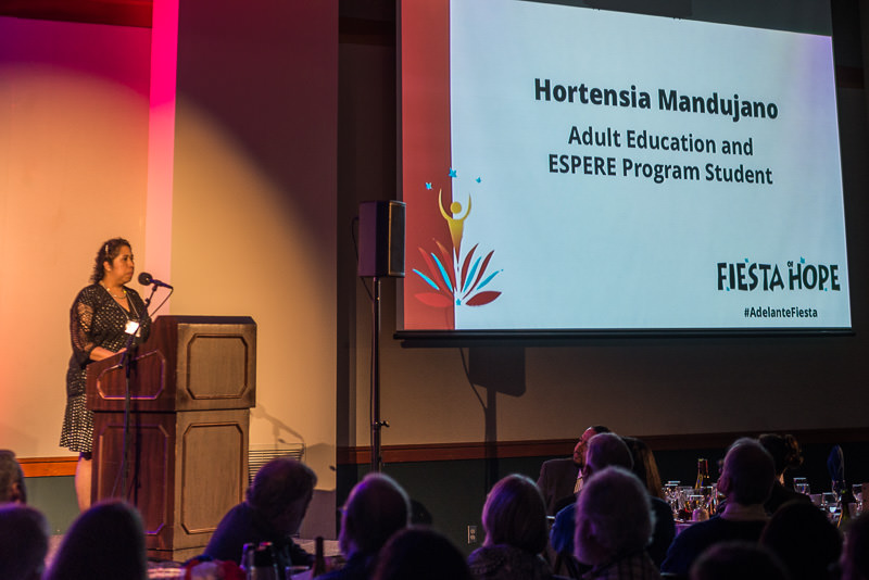 Hortensia Mandujano, Adult Education and ESPERE Program Student, and Teacher's Assistant with Adelante Mujeres Early Childhood Education Program, told her amazing story at Fiesta of Hope.