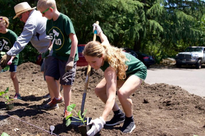 June 6, 2016; Portland, OR, USA; Thorns FC's Mallory Weber working alongside community volunteers in Timber Jim's garden in Tualatin. Photo: Eric Cech-Portland Timbers — at Tualatin School House Pantry.