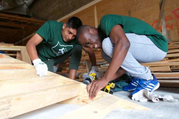 June 9, 2016; Portland, OR, USA; Steve Palacios and Victor Arboleda of Portland Timbers 2 work together to help build a skateboard ramp for youth at Living Cully in NE Portland. Photo: Eric Cech-Portland Timbers
