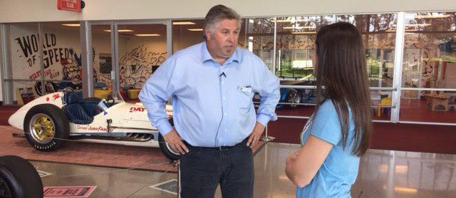 The museum curator, Ron Huegli, is excited to talk with visitors about the exhibit. He secured the 33 special Indy cars by reaching out to collectors and the Indy museum.