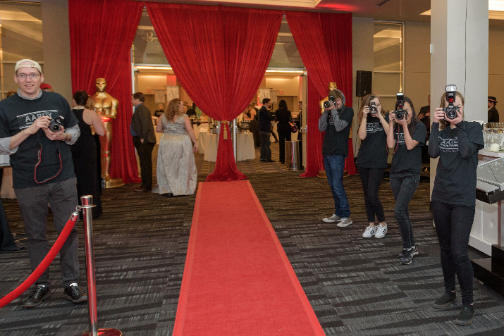 OES Student ‘Paparazzi’ Welcome Auction Guests