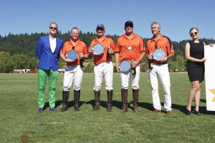 The home team, Hidden Creek Polo Club, secured the title of the first Oregon Polo Classic Champions after defeating Team Bush League/Twin Palms out of California. Hidden Creek Polo Players (left to right) Sean Keys, Graham Bray, Daniel Juarez and Tomas Reinoso were presented with engraved championship silver platters by Rick Mahler, courtesy of Packouz Jewelers. 