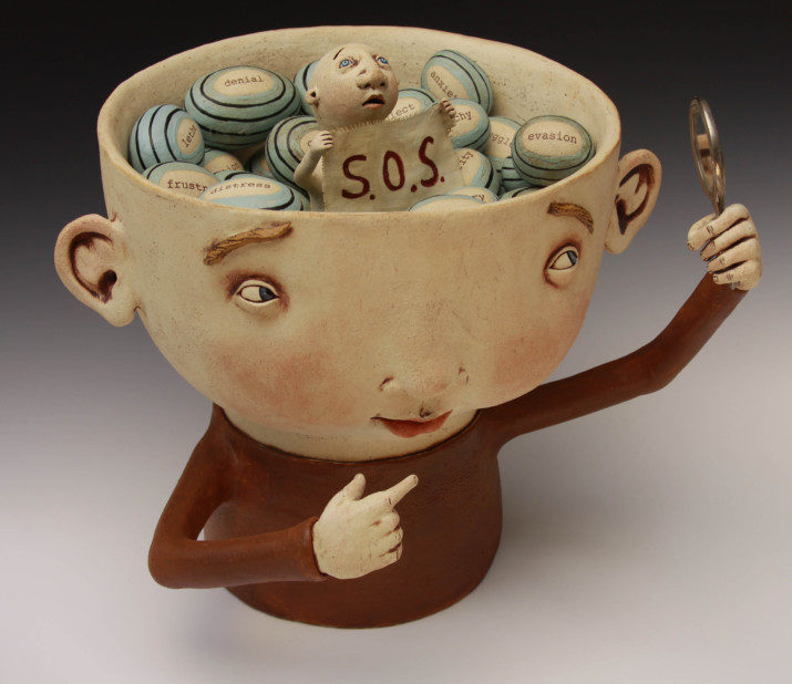 introspection Medium: hand sculpted mid fire figurative stoneware vessel containing 20 hand built ceramic stones, and antique miniature hand mirror, electric fired Artist: Kina Crow