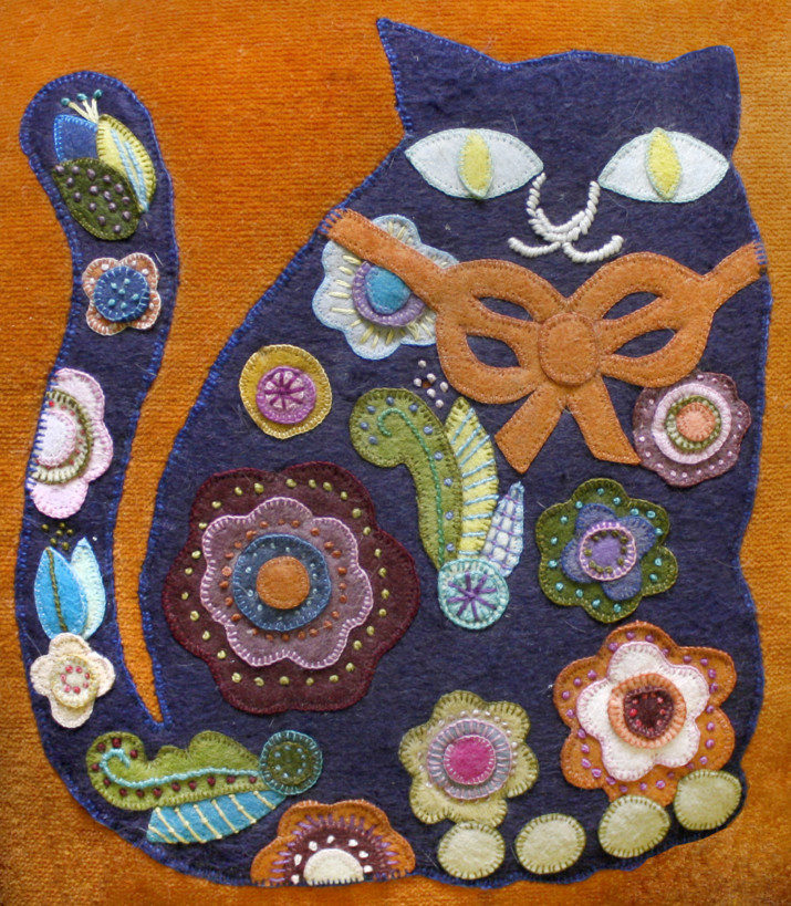 Fiber art cat cushion: Rhoda explored many art mediums, including fiber arts like this playful cat cushion.
