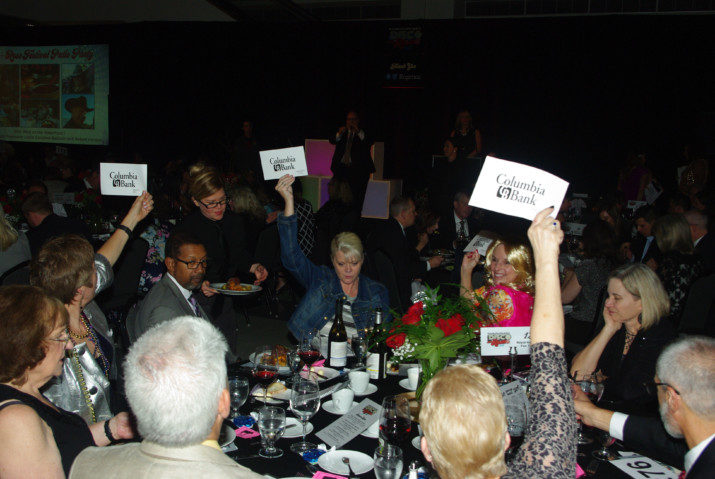 Royal Rosarian table bidding up.