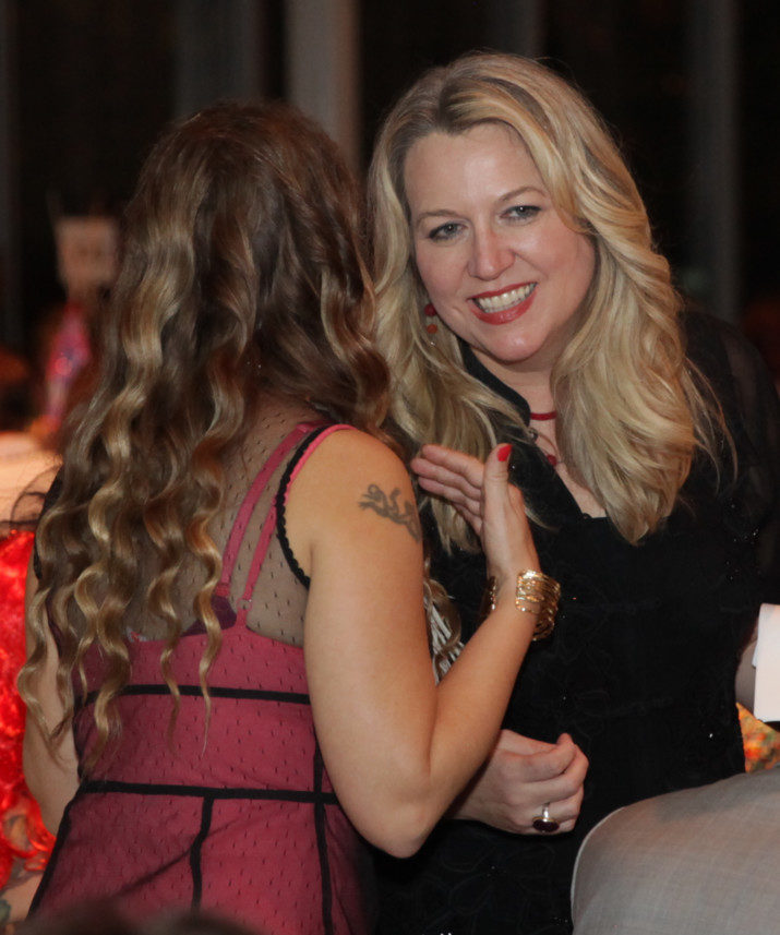 Emcee and CHAP supporter Cheryl Strayed connecting with a guest