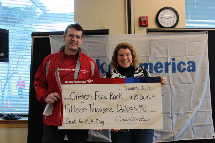 Chris Swindell, Senior Vice President at Bank of America, and Susannah Morgan, CEO of Oregon Food Bank, spent Martin Luther King Jr. Day helping repackage food for 830,000 meals for those in need.