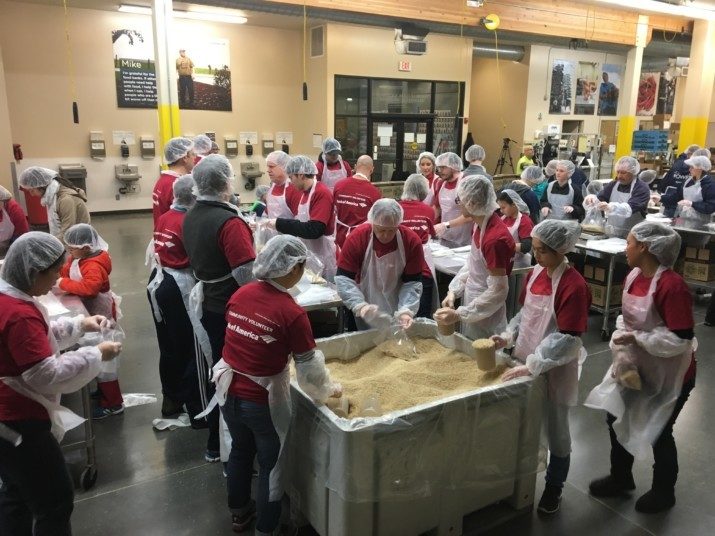 Bank of America employees and their families spent their day off help repackage food at Oregon Food Bank’s sixth annual MLK Day of Service sponsored by Bank of America.