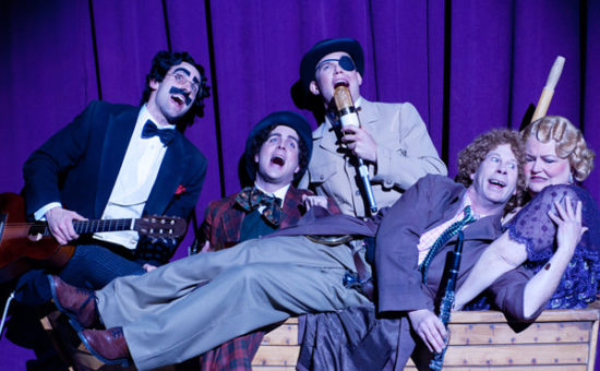 Captain Spaulding (Mark Bedard), Ravelli (John Tufts), Jamison (Eddie Lopez) and The Professor (Brent Hinkley) serenade themselves and Mrs. Rittenhouse (K.T. Vogt). Photo: Jenny Graham.