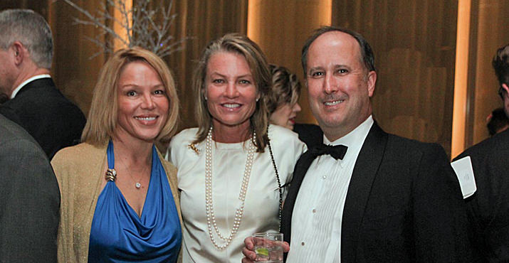 Honoree Linda Rae enjoys the evening with guests Geraldine Bidwell and John Bishop.