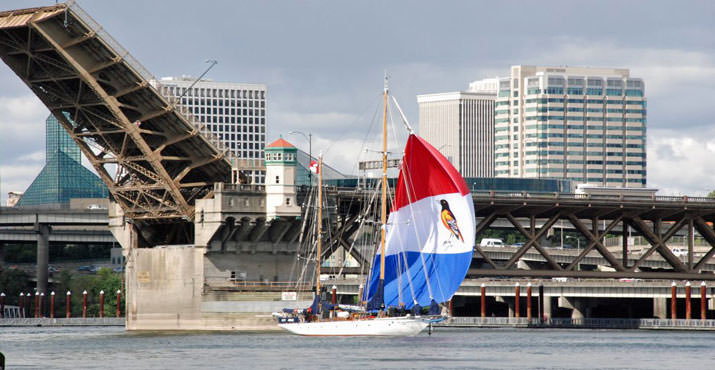 Rose Festival Fleet Week began today with the arrival of HMCS Oriole of the Royal Canadian Navy passing under the Burnside Bridge.
