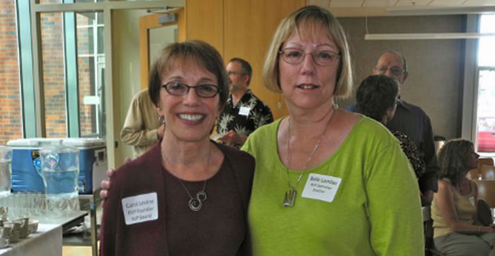 Carol Levine (RVP Founder) and Belle Landau (RVP Executive Director) smile while enjoying the social hour.
