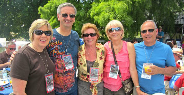 The Safeway crew poses together! Mona Person, Ron Person, Syd Hanigan, a board member, and Cheryl and Bob Helleman helped contribute to the success of the 25th Annual Waterfront Festival