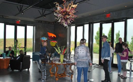 The new Long Shadows winery and tasting room are dramatically located on a hill with a grand view of surrounding countryside with very simple modern architecture highlighted by Dale Chihuly’s glass art including a chandelier and several large organic pieces.