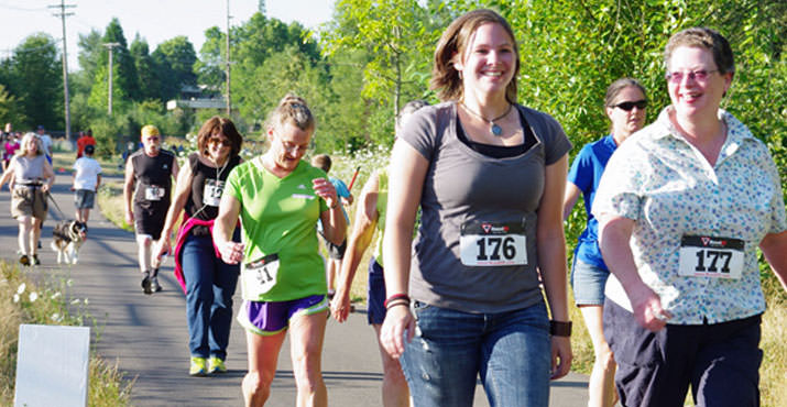 Walkers enjoying the course. Sarah Ayres and Julie Packard (leading other walker) put paws to pavement for CAT.