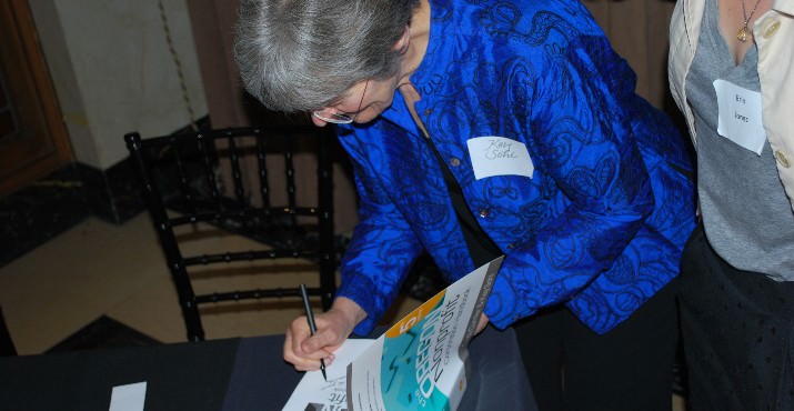 The Oregon Nonprofit Corporation Handbook Author, Kay Sohl signs her book.