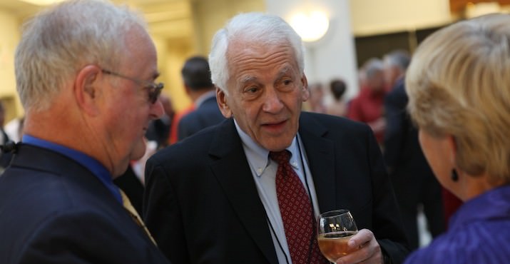 Pacific University trustee Tim Schauermann '61, trustee emeritus Ken Lewis and Nancy Schauermann visit at the university's annual President's Dinner, held Sept. 27 in The Atrium at Montgomery Park.