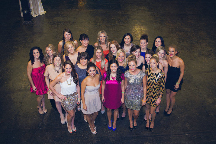 the Levé board, committee and advisory members pose for a shot before the Ball begins last Saturday. They are close to reaching their $50,000 goal.