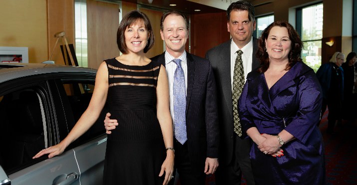 2013 St. Mary's Academy auction co-chairs Allison and Chris Martin and Michael and Dana White