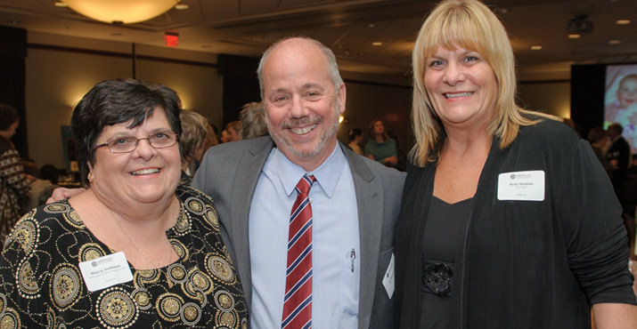 Nancy Anderson, is pictured with Central City Concern Executive Director Ed Blackburn and Holly Redeau, CCC Program Manager of Family Housing.