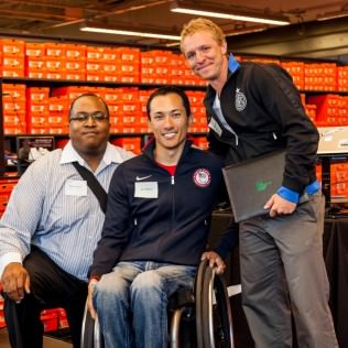 Nike Paralympian Gold Medalist and rugby wheelchair athlete Will Groulx with grant recipient representatives Andre Ashley, Sports Management Supervisor, Portland Parks & Recreation and Kaig Lightner, Director of Coaching, Portland Community Football Club. Grant: To launch the Portland Community Football Club, a community-based soccer club emphasizing the principles of equal access to sport and diversity, and providing affordable, high-quality soccer for Portland youth.