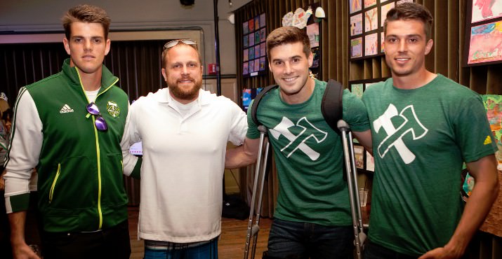 Portland Timber player Jake Gleeson, Timber Joey, and players Dave Horst & Ryan Kawulok. The Portland Timbers performed a medley of hip hop classics in their second year as celebrity performers for the event.