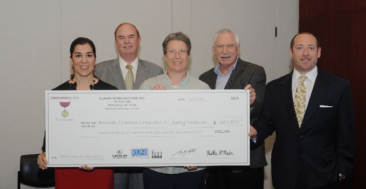 The Classic Wines Auction presents Randall Children’s Hospital with $363,804 raised from its gala annual auction. Pictured left to right: Heather Martin, Classic Wines Auction executive director, Keith Barnes, Classic Wines Auction board member, Liz MacDonell, executive director, Randall Children's Hospital Foundation, Rick Hawkins, Classic Wines Auction board member and Shawn Menashe, Classic Wines Auction board member.